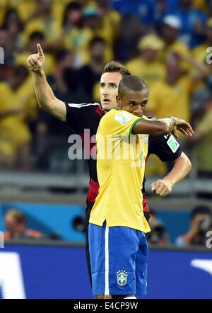 Belo Horizonte, Brazil. 8th July, 2014. Germany's Miroslav Klose (back) celebrates after scoring during a semifinal match between Brazil and Germany of 2014 FIFA World Cup at the Estadio Mineirao Stadium in Belo Horizonte, Brazil, on July 8, 2014. Credit:  Liu Dawei/Xinhua/Alamy Live News Stock Photo