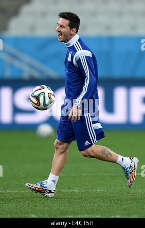 Sao Paulo, Brazil. 08th July, 2014. Argentina's Lionel Messi practices during a training session at the Arena Corinthians in Sao Paulo, Brazil, 08 July 2014. Argentina will play a FIFA World Cup semi final match against the Netherlands on 09 July 2014. Photo: Marius Becker/dpa/Alamy Live News Stock Photo