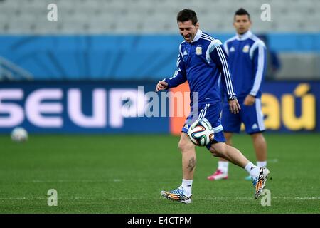 Sao Paulo, Brazil. 08th July, 2014. Argentina's Lionel Messi practices during a training session at the Arena Corinthians in Sao Paulo, Brazil, 08 July 2014. Argentina will play a FIFA World Cup semi final match against the Netherlands on 09 July 2014. Photo: Marius Becker/dpa/Alamy Live News Stock Photo