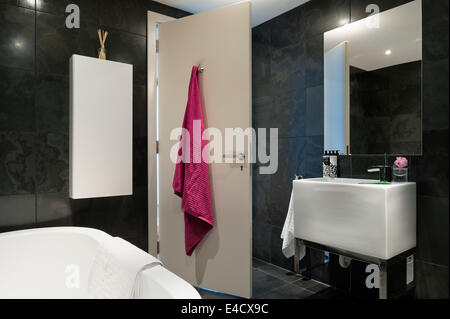 Catalano Verso sanitaryware in bathroom with Welsh slate tiles Stock Photo