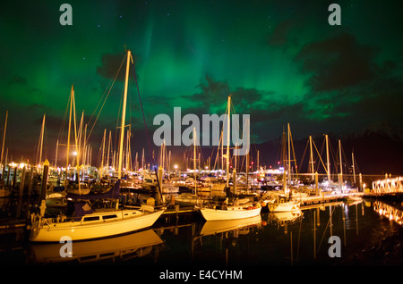 Aurora borealis over Seward Boat Harbor, Resurrection Bay, Seward, Alaska. Stock Photo