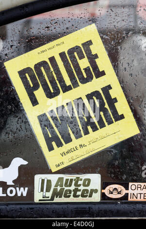 Police aware Sticker on car window Stock Photo