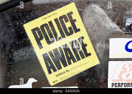 Police aware Sticker on car window Stock Photo