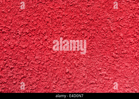 Red Rough Concrete Wall Background/ Texture. Stock Photo