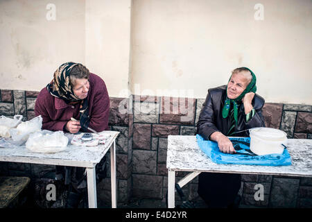 Two saleswomen on the central market, Lviv, Western Ukraine, Ukraine Stock Photo