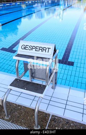 Public swimming pool, sign 'Gesperrt', German for 'Closed', Madeira, Portugal Stock Photo