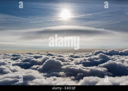 Lenticular cloud, Cumulus lenticularis, above the top layer of clouds, North Rhine-Westphalia, Germany Stock Photo