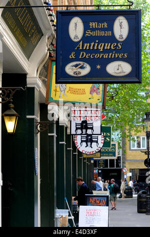 London, England, UK. Cecil Court, off Charing Cross Road, full of bookshops and antique shops Stock Photo