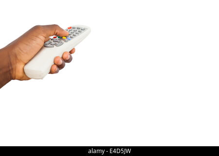 Mans hand holding remote control Stock Photo