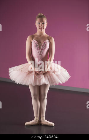 Graceful standing in first position in the ballet studio Stock Photo - Alamy