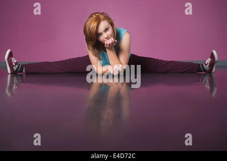 Pretty break dancer doing the splits Stock Photo