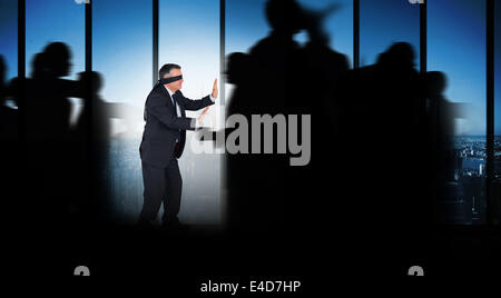 Composite image of silhouette of business people walking Stock Photo