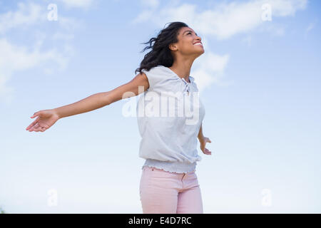 Casual pretty woman enjoying the sunshine Stock Photo