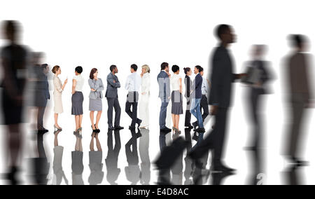 Composite image of many business people standing in a line Stock Photo