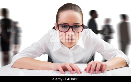 Composite image of businesswoman typing on a keyboard Stock Photo