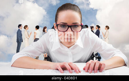 Composite image of businesswoman typing on a keyboard Stock Photo
