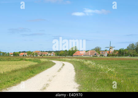 Landscape with windmill at the Dutch wadden island Terschelling Stock Photo