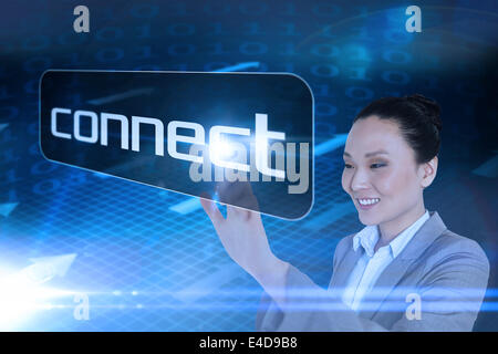 Businesswoman pointing to word connect Stock Photo
