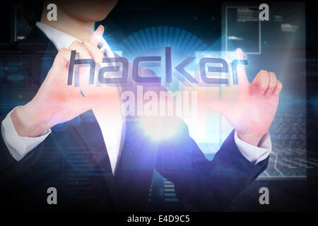 Businesswoman presenting the word hacker Stock Photo