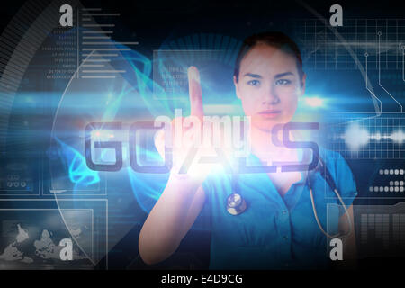 Doctor pointing to the word goals Stock Photo
