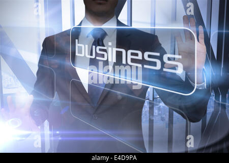 Businessman presenting the word business Stock Photo
