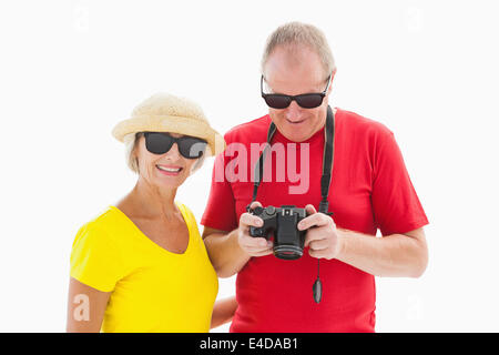 Happy mature couple wearing sunglasses Stock Photo