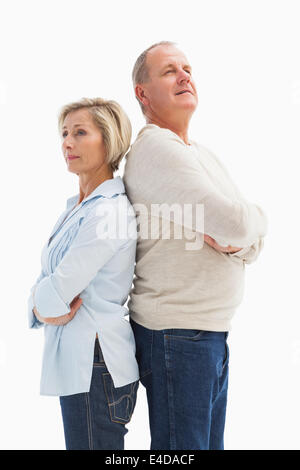Mature couple standing and thinking Stock Photo