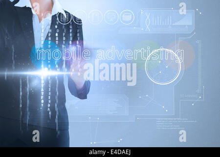Businesswoman touching the words mobile advertising on interface Stock Photo