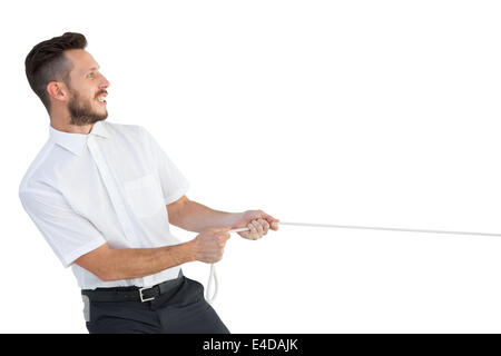 Hipster businessman pulling a rope Stock Photo