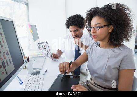 Young editorial team working together Stock Photo