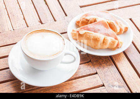 Meal set of coffee latte and croissants Stock Photo