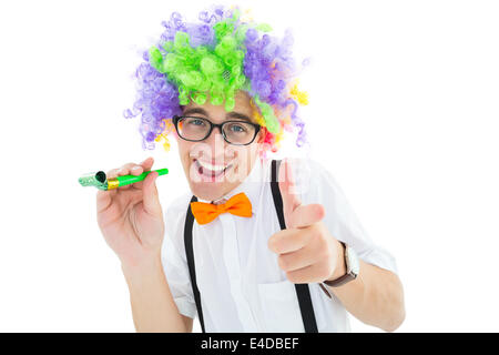 Geeky hipster in afro rainbow wig Stock Photo