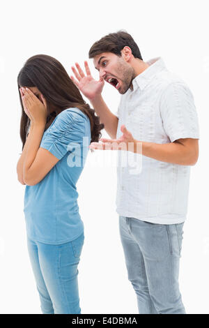 Angry man shouting at girlfriend Stock Photo