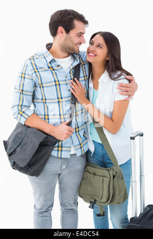 Attractive young couple going on their holidays Stock Photo