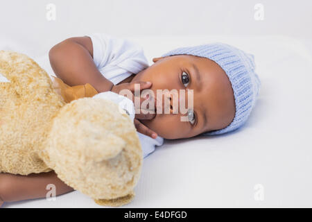Adorable baby boy with teddy Stock Photo - Alamy
