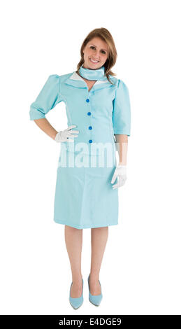 Portrait of a charming stewardess dressed in blue uniform Stock Photo