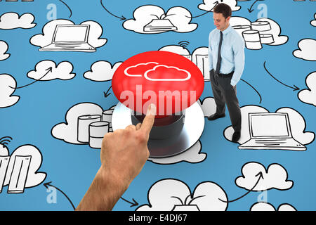 Composite image of happy businessman standing with hands in pockets Stock Photo