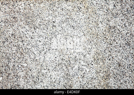 Granite background with a mottled black spotted textured effect Stock Photo