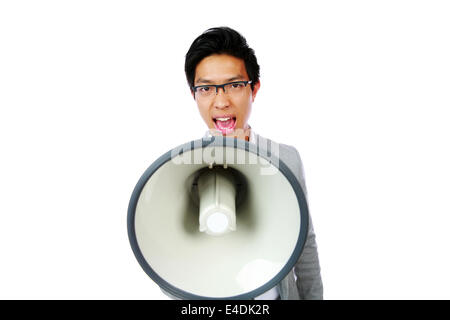 Portrait of young asian man shouting with megaphone Stock Photo