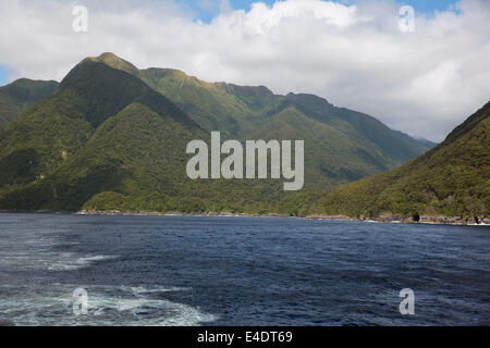 Sunny mountains in Doubtful Sound Stock Photo