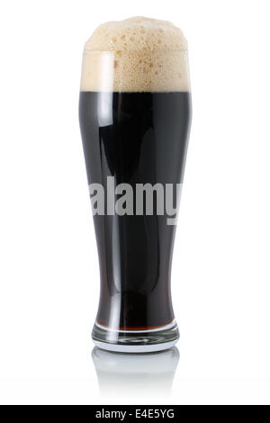 Dark beer in a glass with foam, isolated on a white background Stock Photo