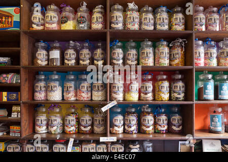 Old-fashioned sweets in old-fashioned sweetie jars in the Country Stores in the Cotswold village of Marshfield, South Gloucestershire UK Stock Photo
