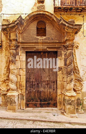 The Baroque portal doorway on the 18th Century Casa Dels Sanchez de Contanda in Benassal (Houes of Sanchez Cotanda), Castellon, Stock Photo