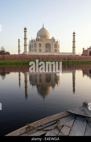 Taj Mahal and reflection on river Yamuna, seen from a boat. Stock Photo