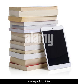 Stack of paperback books with an iPad tablet Stock Photo