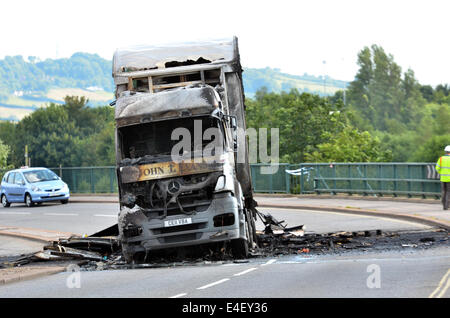 Bristol, UK. 9th July, 2014. Burnt out lorry causes major delays to Bristol City Travelers. Travelers to Bristol Airport were also badly affected. Credit:  Robert Timoney/Alamy Live News Stock Photo