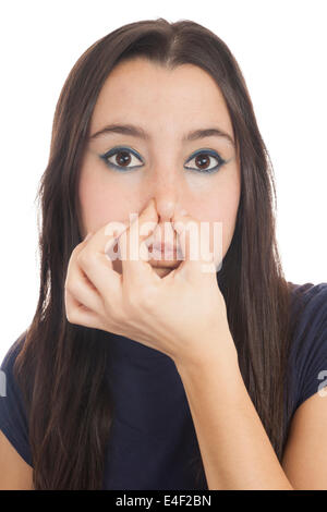 Close-up of a woman holding her nose isolated on white Background Stock Photo