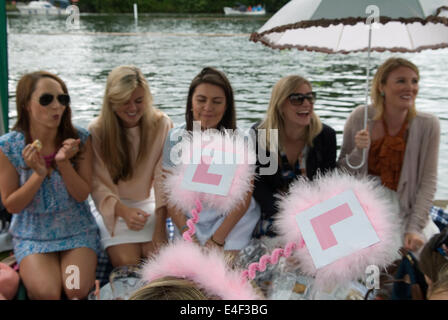 Hen do woman getting married wearing learner car plates for learner on her rabbit ear headgear. 2010s Henley Royal Regatta Henley on Thames 2014 HOMER SYKES Stock Photo