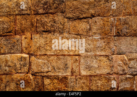 Ancient stone wall texture close up background Stock Photo