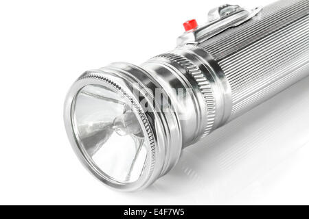 Old metal pocket flashlight isolated on white background Stock Photo